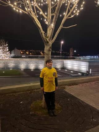 Sam Donaghy, who has raised over £4,000 for charity by walking 100 miles in a month.