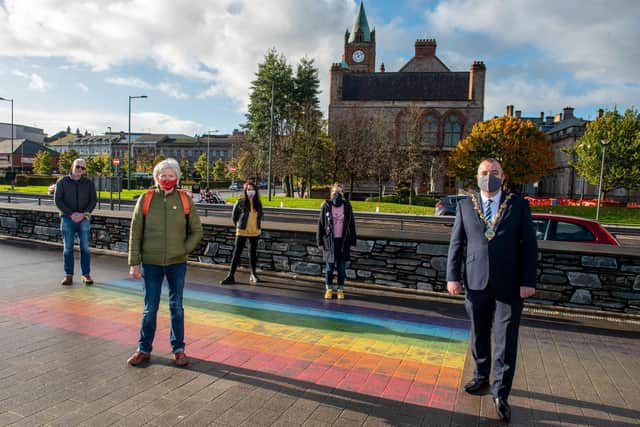 Mayor Brian Tierney earlier this year at the Rainbow Pathway on the quayside with Sha Gillespie, Jim Doherty, Chair of Foyle Pride, Dee Abbott and Catherine Hemelryk from Foyle Pride. Picture Martin McKeown. 23.10.20