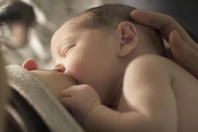 A baby being breastfed