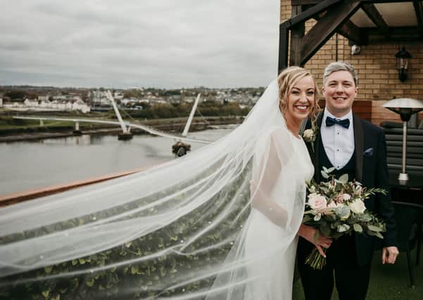 On top of the world.... Catriona and Gerard O'Doherty from Derry pictured on their wedding day on top of the City Hotel. (Photos: James Aiken Photography)