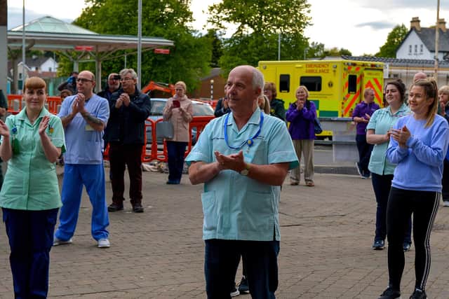 MAY: Altnagelvin hospital care staff show their appreciation for and clap for the support given to NHS frontline staff by the public. DER2020GS – 039