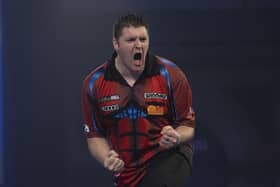 Daryl Gurney celebrates his victory over Vincent van der Voort. PICTURE: Lawrence Lustig/PDC