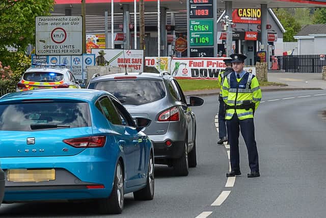 Members of An Garda Síochána operate a vehicle checkpoint on the main Muff to Derry border crossing, a feature of life in 2020.  DER1920GS – 004