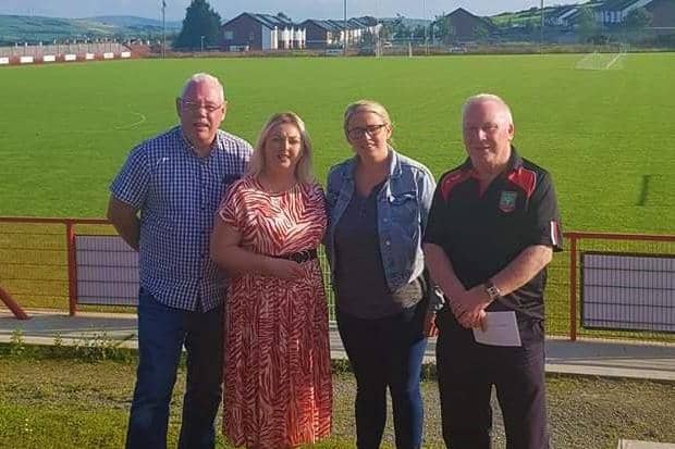 Karen Mullan MLA and Councillor Tina Burke with Seán Dolan officials during a visit to the club grounds.