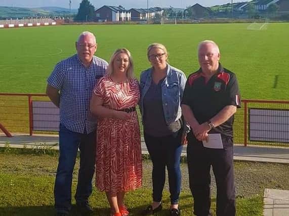 Karen Mullan MLA and Councillor Tina Burke with Seán Dolan officials during a visit to the club grounds.