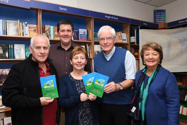 2019: Fr Neal Carlin, second from right, pictured at the launch of his previous book 'Favourite Celitc Saints, A Simple Book of Prayers' in Veritas with, from left, John Cooper, Paul Porter, Margaret Cooper and Marguerite Hamilton. DER3719-131KM