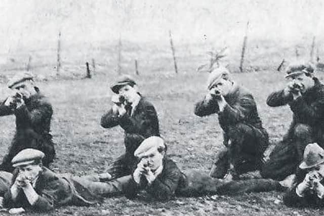 Members of the IRA training in fields in Creggan in the early 1920s.
