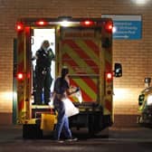 Medical staff attending to patients in an ambulance, at Antrim Area Hospital, Co Antrim in Northern Ireland.