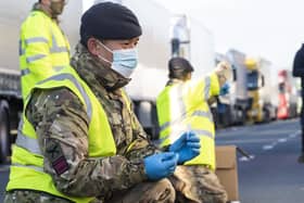 British soldier helps with the rolling out of Covid-19 tests in England.