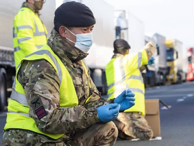 British soldier helps with the rolling out of Covid-19 tests in England.