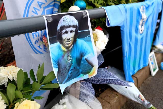 Tributes are left outside the ground for former Manchester City player Colin Bell, who died last week, prior to the beginning of the Emirates FA Cup third round match at the Etihad Stadium,