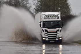 Motorists struggling threw floods on the Moira Road on Tuesday,  as Storm Christoph is set to bring widespread flooding. (Photo: Colm Lenaghan/Pacemaker)