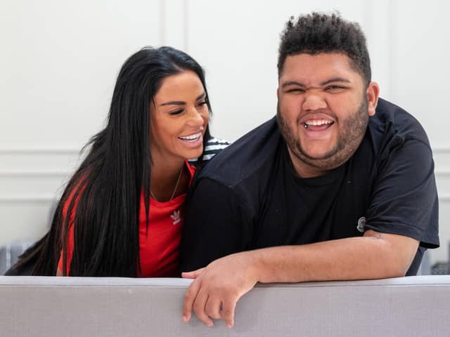 Katie and Harvey enjoy a laugh together