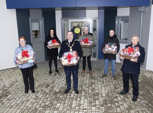 Mayor Tierney pictured recently in Rosemount during the distribution of hampers by the Foyleside DEA with Eileen Kivlehan, Rosemount Resource Centre, Kat Kealey, Foyleside DEA (Locality Youth Partnership), Tommy Taylor, Rosemount Resource Centre, Adrian Kelly, GDII and Min McCann, BHCP. (Photo: Jim McCafferty Photography)