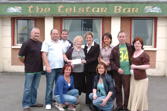 2008: Eamonn (Peggy) McCourt, second from right, pictured with others outside The Telstar. (0608SL02)