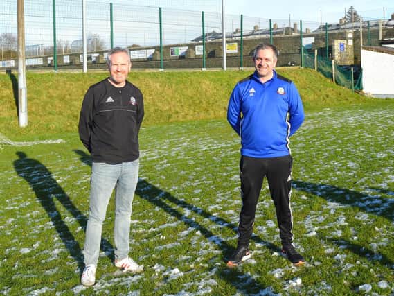 Tommie Caldwell Buncrana Hearts, Chairman congratulating new Senior Team Manager Gary Duffy (right).