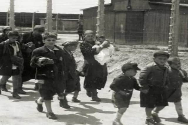 People arriving in Auschwitz as displayed in one of the photos at the Auschwitz site (Phot Brendan McDaid/ Derry Journal)