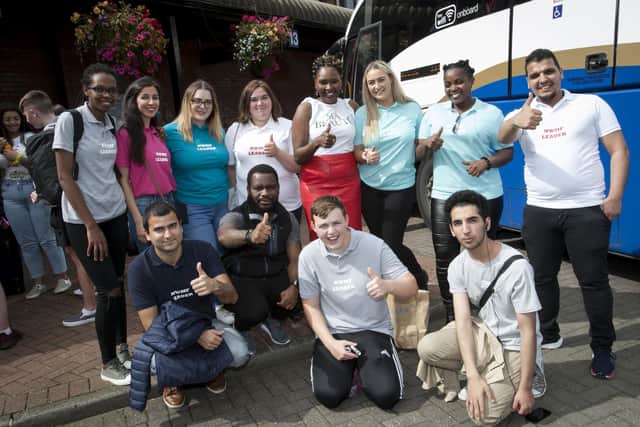 2019: Lilian Seenoi-Barr, Director of Programmes, North West Migrants Forum with the team leaders before their departure for a ‘Discover-Connect-Belong’ residential weekend in Belfast.