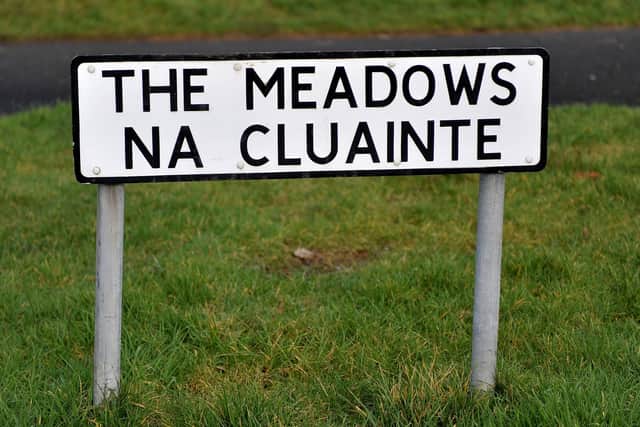 Bilingual street sign at The Meadows . DER2104GS â€“ 045