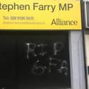 Graffiti daubed on Stephen Farry's office in Bangor.