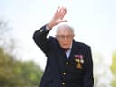 File photo dated 16/04/2020 of the then 99-year-old war veteran Captain Tom Moore at his home in Marston Moretaine, Bedfordshire, after he achieved his goal of 100 laps of his garden