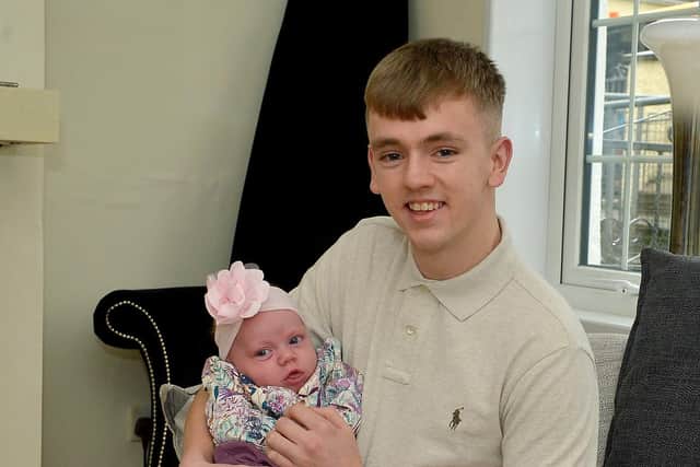 Harkin and his eight month old daughter Indie.