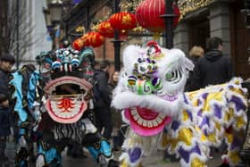 Dragon dancers celebrating the Chinese New Year in pre-COVID-19 times.