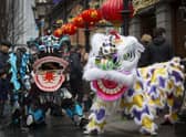 Dragon dancers celebrating the Chinese New Year in pre-COVID-19 times.