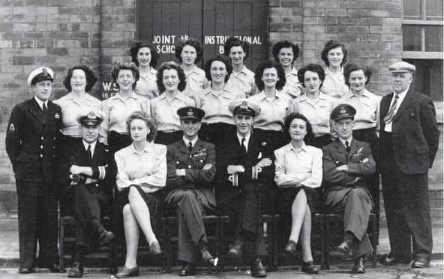 Staff of the Anti-Submarine Training School established in Derry included a large number of Wrens. Maeve Boyle is standing third from left in the second row.