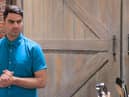 Chris Bavin presenting the trio with a gourd apiece