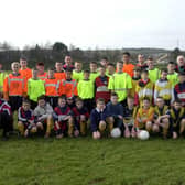 A group of young players and coaches at a Derry & District Youth Academy training session at Lisnagelvin Playing Fields