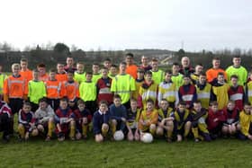 A group of young players and coaches at a Derry & District Youth Academy training session at Lisnagelvin Playing Fields