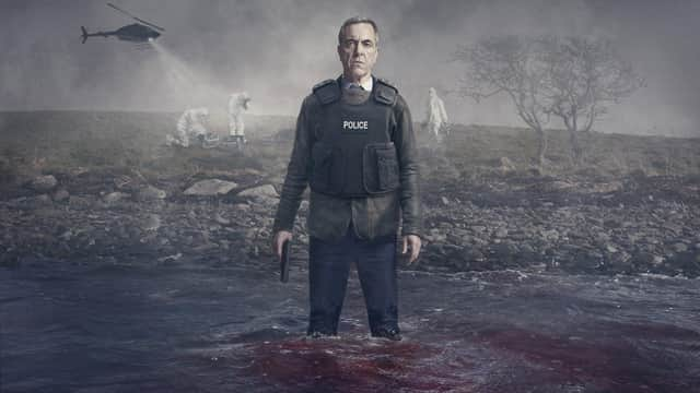 Tom Brannick (James Nesbitt)