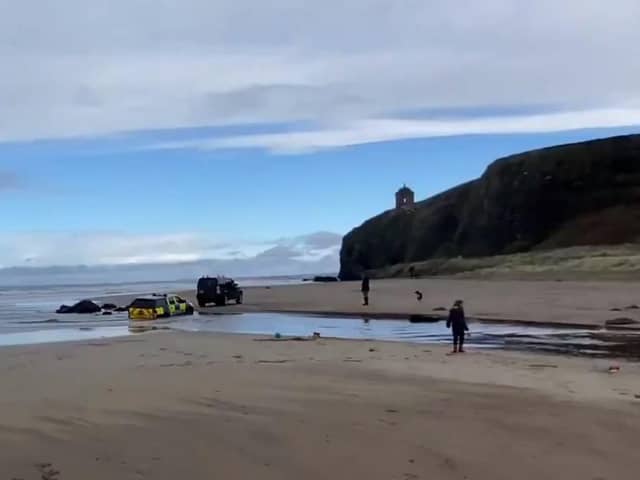 A police car got in difficulty at Downhill yesterday.