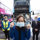 Infrastructure Minister Nichola Mallon, pictured previously with Translink Group Chief Executive Chris Conway and Translink’s Nicole Green (left) reminding everyone that face coverings are compulsory when travelling on public transport.