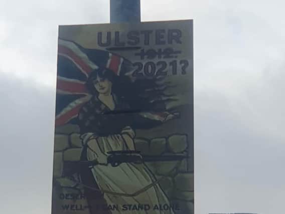 A placard based on a historical poster alluding to the arming of the UVF.