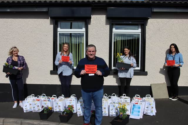 Members of the Ballyarnett Community Support Team who delivered a Red Card support scheme for residents to put on their windows if they needed help, which also delivering help packs, food parcels, and colourful garden arrangements.