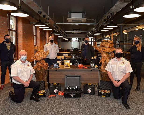 A donation totalling £39,000 from local video game developer Hypixel Studios, parent company Riot Games Social Impact fund, the owners of the Hypixel Minecraft server, Hypixel Studios CEO Aaron Donaghey, and an anonymous donor has enabled Foyle Search & Rescue to upgrade  its drone program. Pictured at the Hypixel Studios in Patrick Street yesterday afternoon are, from left, Shay Glenn, Officer Manager Hypixels Studios, Sean Durnin, FSR Drone Team, Pat Carlin, FSR Chairman,  Sean McCafferty, Chief Operating Officer of Hypixel Studios, Paul Smith, FSR Drone Team Co-ordinator and Holly Johnston, Recruitment Officer Hypixel Studios.  DER2109GS – 009