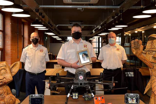Foyle Search & Rescue members Pat Carlin, Chairman, Paul Smith, Drone Team Co-ordinator and Sean Durnin, Drone Team, pictured at Hypixel Studios Derry with upgraded drone equipment facilitated by a donation totalling £39,000 from local video game developer Hypixel Studios, parent company Riot Games Social Impact fund, the owners of the Hypixel Minecraft server, Hypixel Studios CEO Aaron Donaghey, and an anonymous donor. The drone is named Delta November (DN1) after FSR team member localman Danny Nelis who died on 12 January 2019. DER2109GS - 010