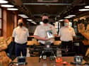 Foyle Search & Rescue members Pat Carlin, Chairman, Paul Smith, Drone Team Co-ordinator and Sean Durnin, Drone Team, pictured at Hypixel Studios Derry with upgraded drone equipment facilitated by a donation totalling £39,000 from local video game developer Hypixel Studios, parent company Riot Games Social Impact fund, the owners of the Hypixel Minecraft server, Hypixel Studios CEO Aaron Donaghey, and an anonymous donor. The drone is named Delta November (DN1) after FSR team member localman Danny Nelis who died on 12 January 2019. DER2109GS - 010