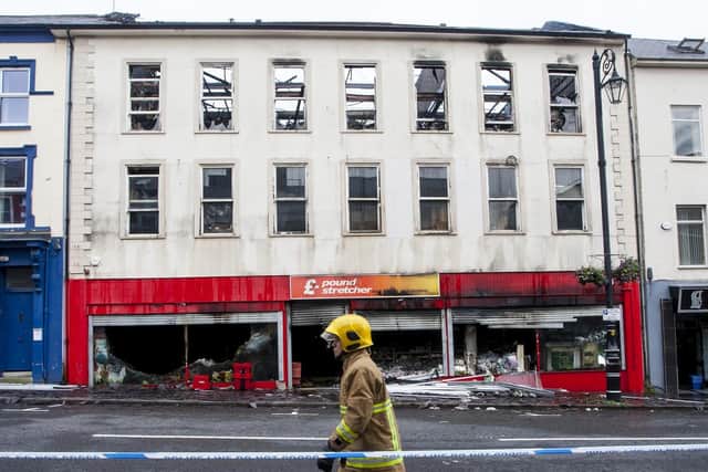 GUTTED!. . . .The Poundstretcher premises on Bishop Street yesterday, after an overnight fire gutted the three storey premises. DER2815MC059