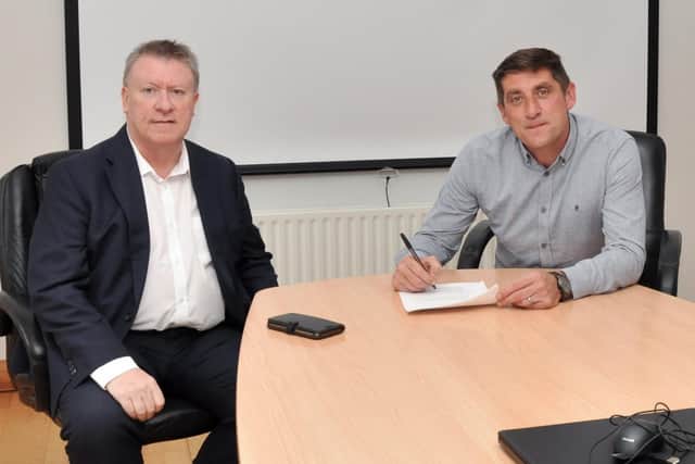 BIG PLANS . . . Derry City Chairman, Philip O'Doherty and manager, Declan Devine.