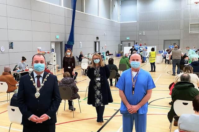 The Mayor Brian Tierney with health staff at Foyle Arena.