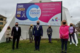 Pictured during the launch of the Covid, Cancer and You Project at Free Derry wall are Sabrina Lynch, Old Library Trust, Colum Eastwood MP, Dervla Collins, Pink Ladies, the Mayor of Derry and Strabane Colr. Brian Tierney, Donna McCloskey, TRIX Neighbourhood management team, Michelle McLaren, Pink Ladies and Orla Robinson BBHF and Team Saoirse. DER2110GS – 014