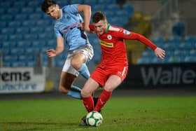 Longford Town defender Joe Gorman pictured playing for Cliftonville against Ballymena's Adam Leckey.