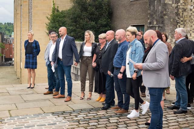 Detective Inspector Gemma Hunter, Greg Llewellyn, Dean Radford, Lee Smith, Dion Raitt, Bill Seymour atop the courthouse steps at Winchester Crown Court after the sentencing of Bob Higgins