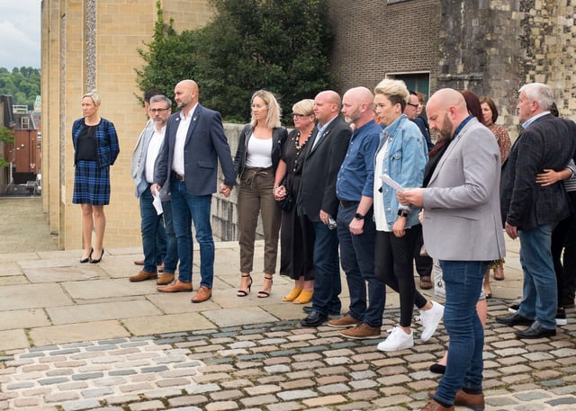 Detective Inspector Gemma Hunter, Greg Llewellyn, Dean Radford, Lee Smith, Dion Raitt, Bill Seymour atop the courthouse steps at Winchester Crown Court after the sentencing of Bob Higgins