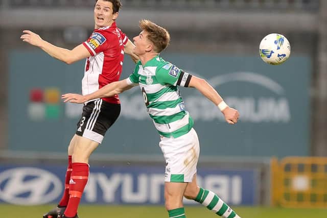Ciaran Coll pictured in action against Shamrock Rovers' Ronan Finn.