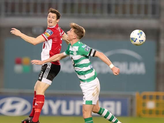 Ciaran Coll pictured in action against Shamrock Rovers' Ronan Finn.