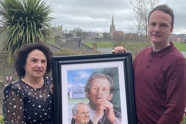 Bernie and Fiachra McGuinness, wife and son of the late Martin McGuinness, with the new portrait.